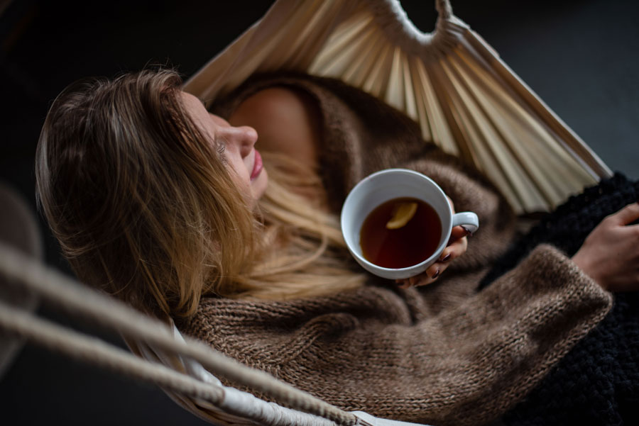 Relaxing in a hammock indoors goes best with calm music.